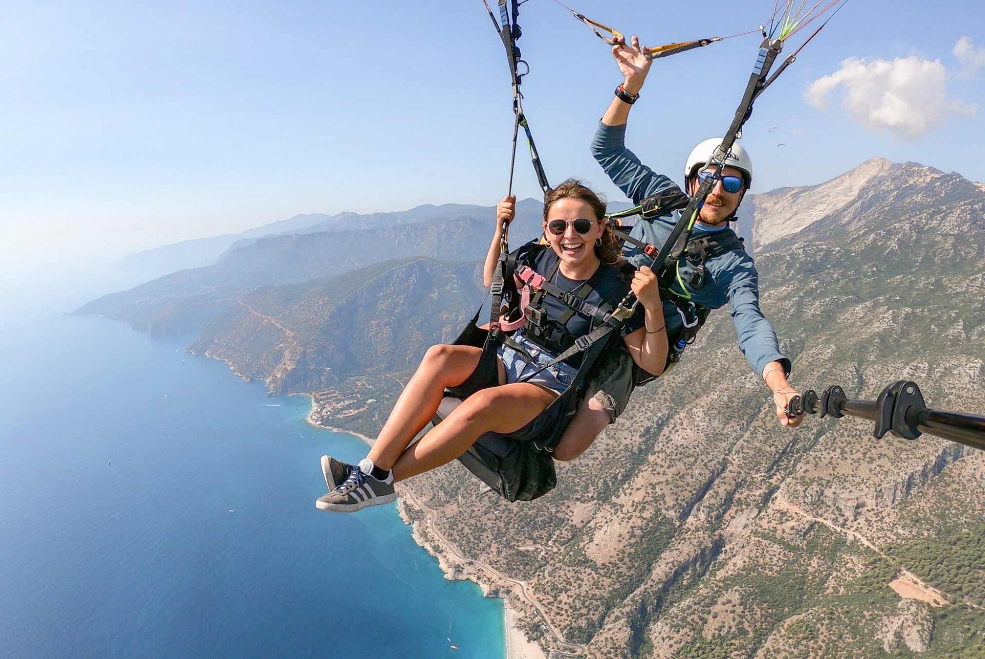 Woman paragliding over Oludeniz